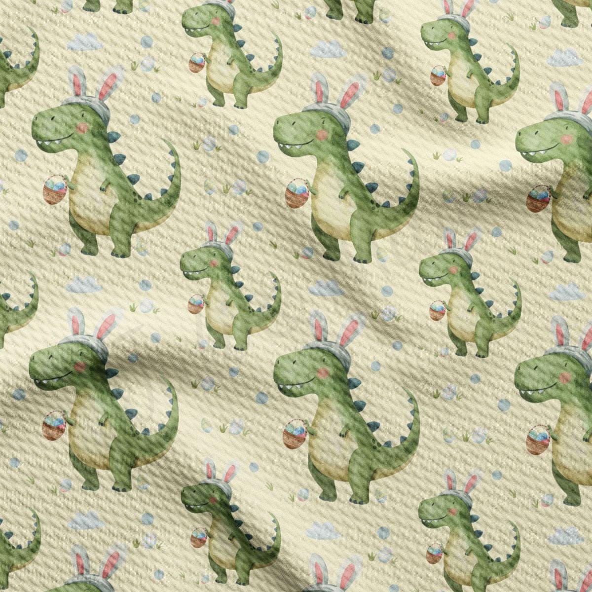 a pattern of a green dinosaur with bunny ears