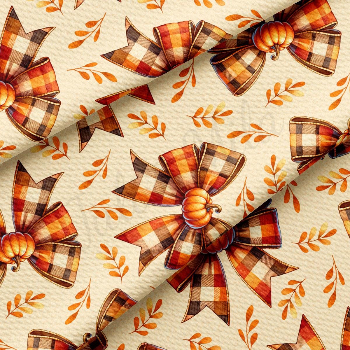 a repeating pattern of plaid bows and pumpkins, creating a festive autumn-themed design.