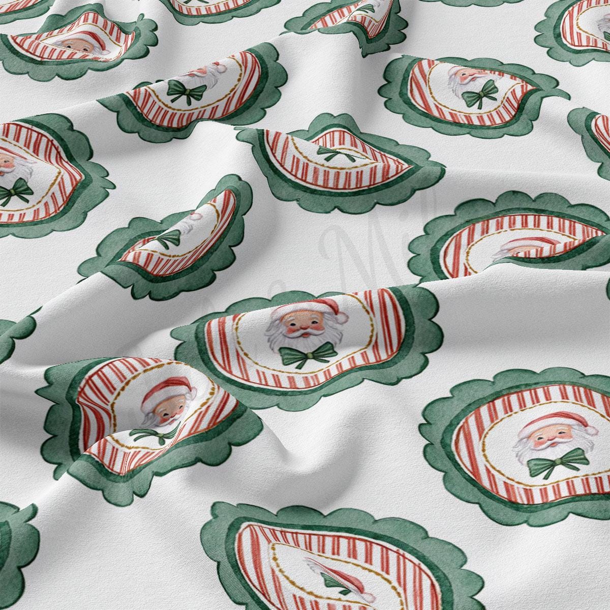 a repeating pattern of Santa Claus faces and green and red scalloped edges on a white background.