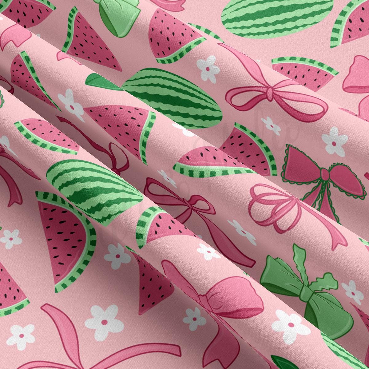 a pink background with watermelon slices and bows