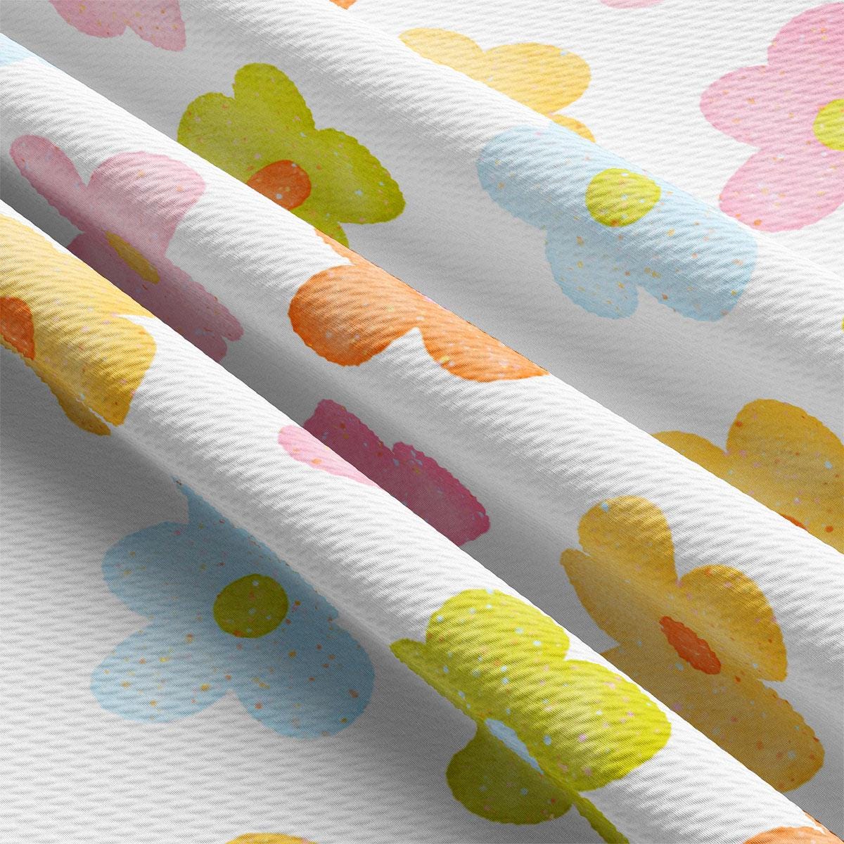 a close up of a pattern of flowers on a white background