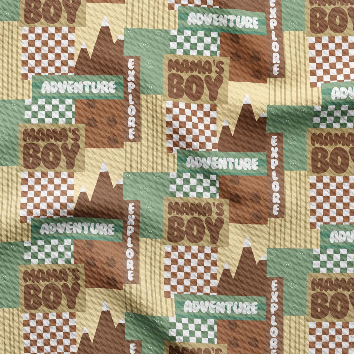 a fabric with a pattern of mountains and words