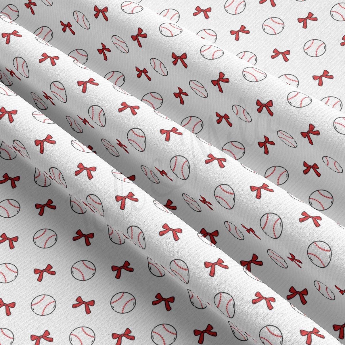 a white background with red bows and baseballs