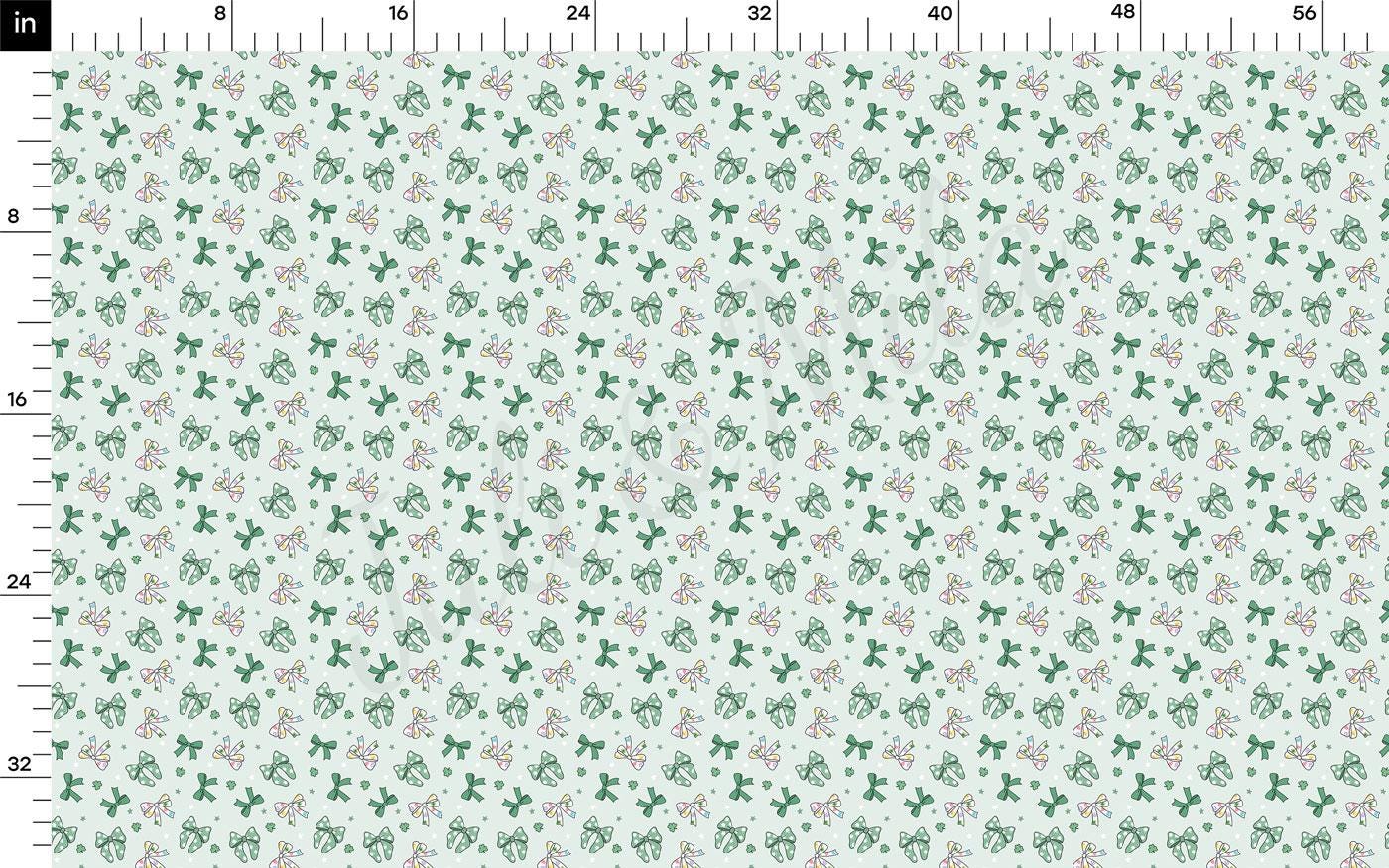 a ruler with a green and pink pattern on it