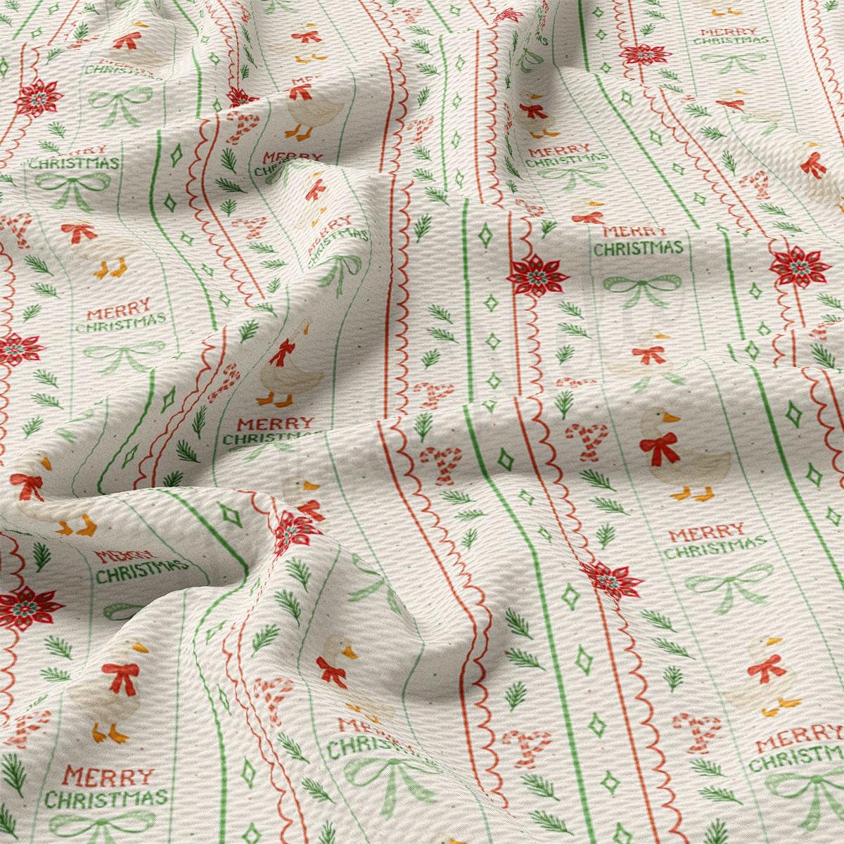 The image is a close-up of a fabric with a repeating pattern of Christmas-themed designs, including red and green stripes, flowers, and the text "Merry Christmas".