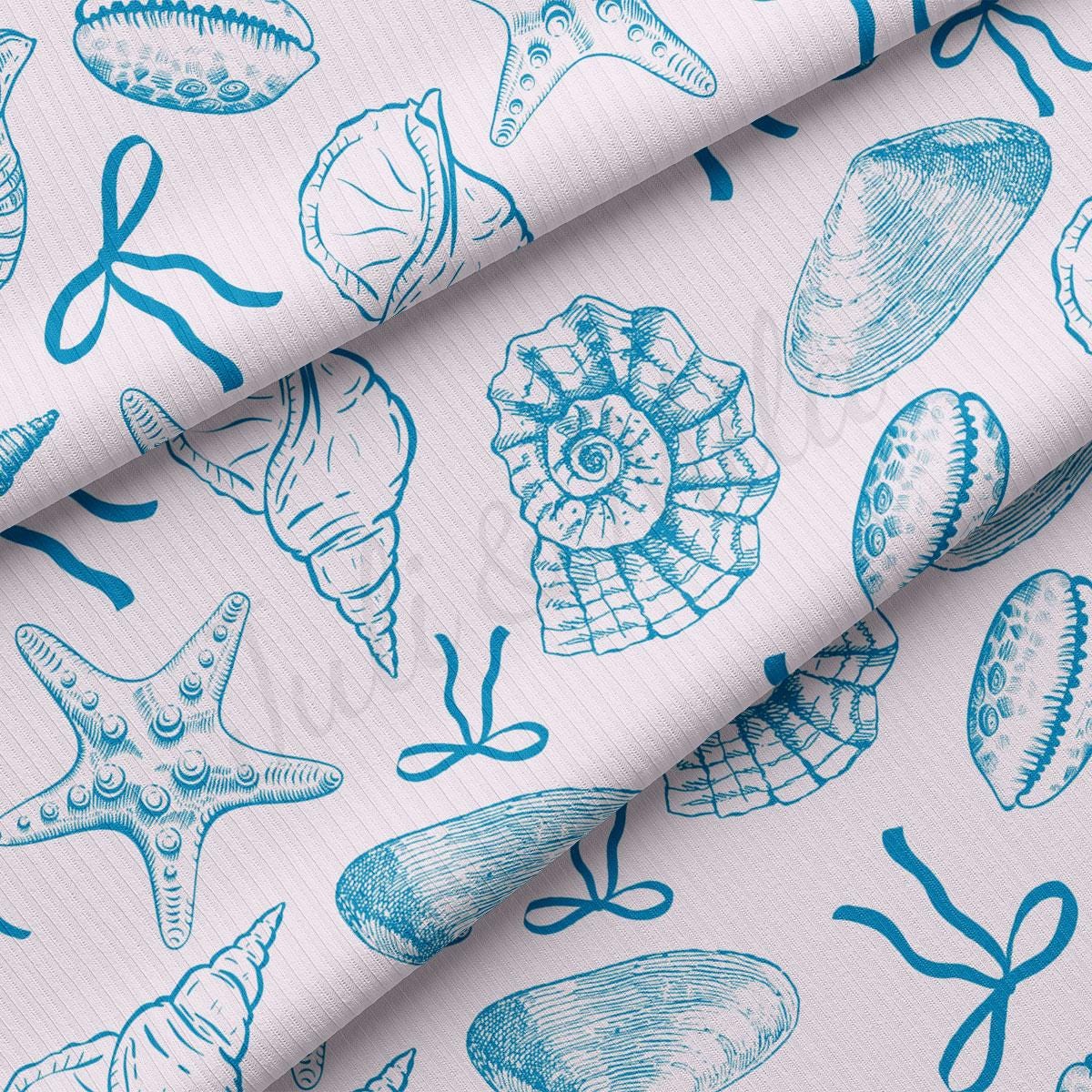 a blue and white pattern of seashells on a white background