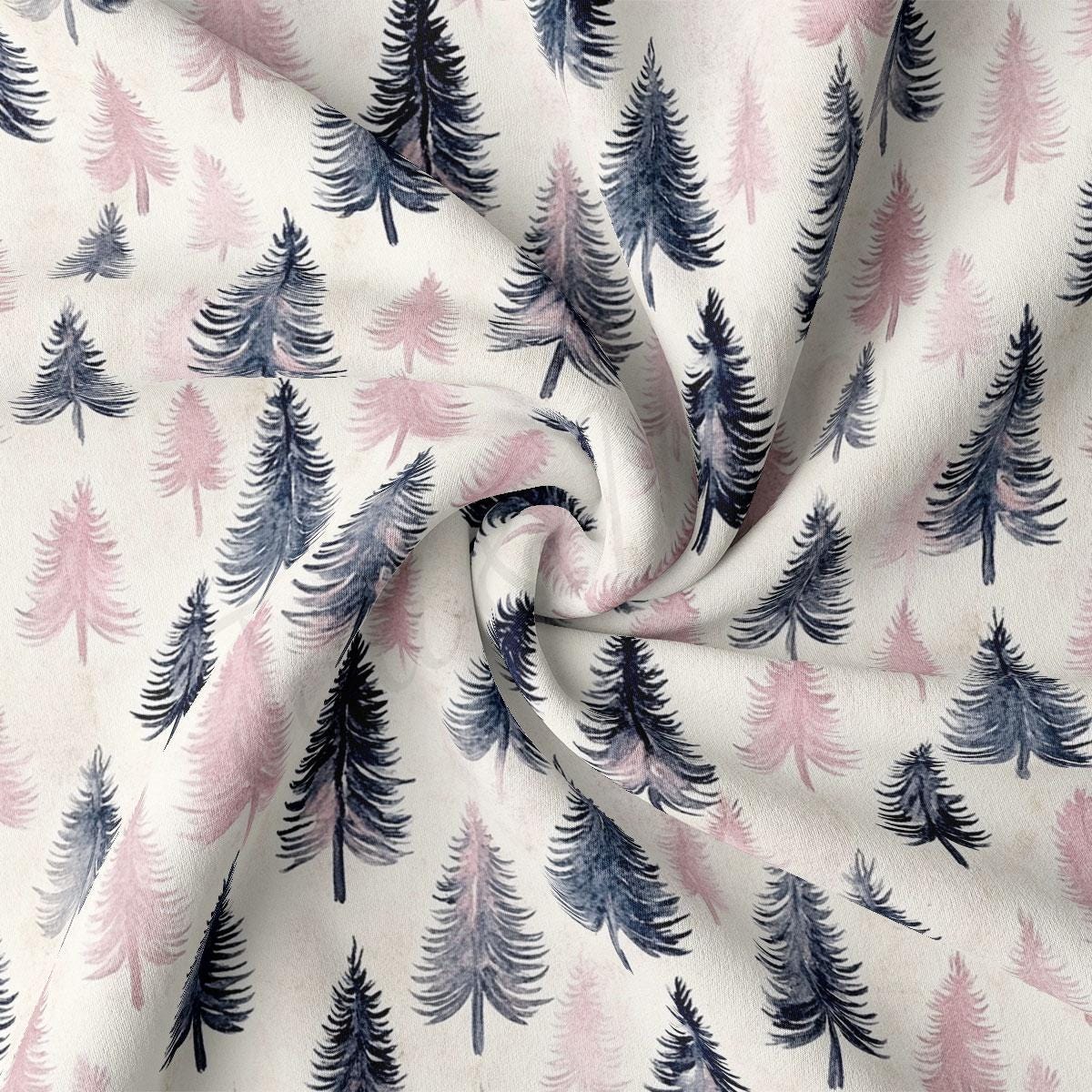 a close-up view of a fabric with a repeating pattern of stylized pine trees in shades of pink and blue.