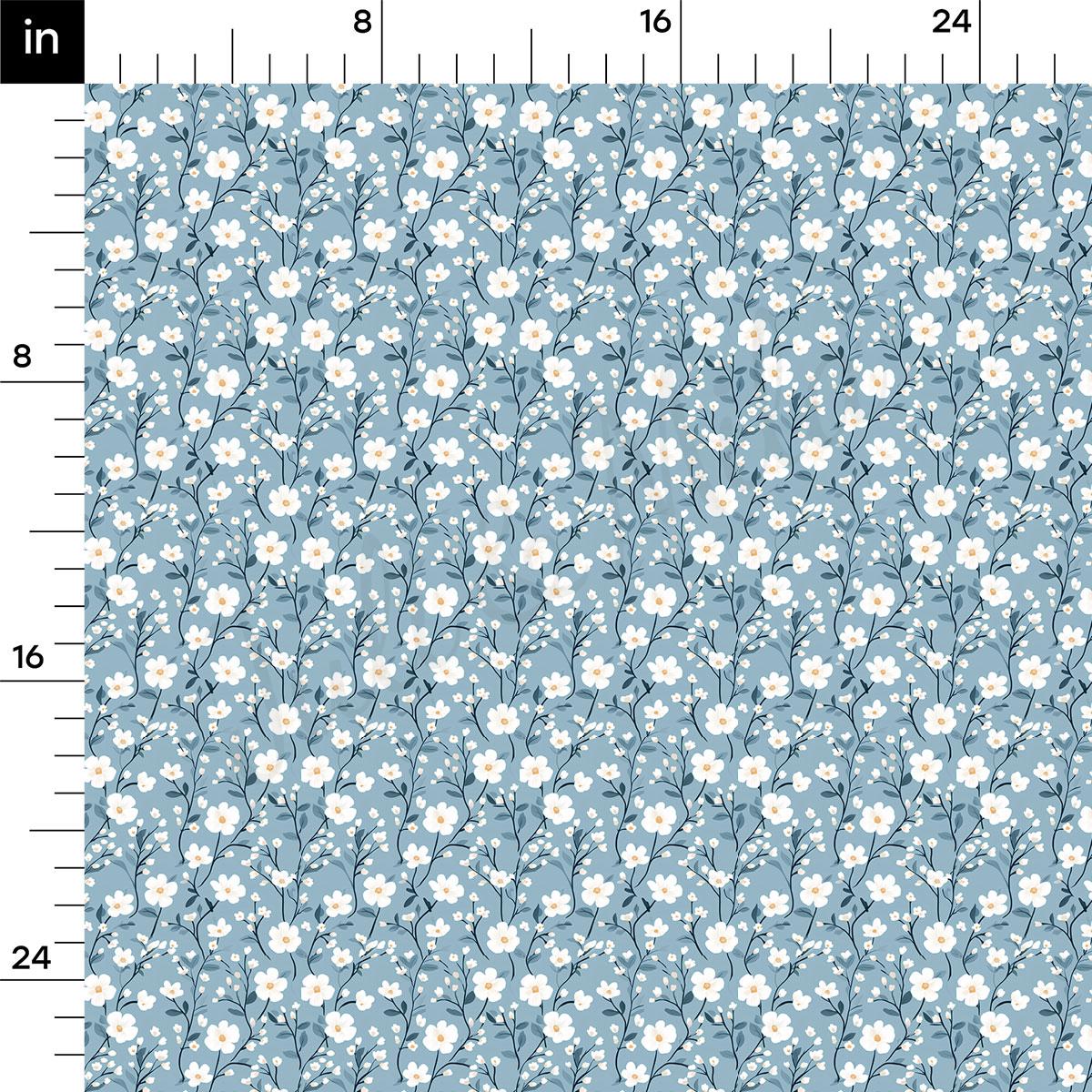 a repeating pattern of white flowers on a blue background.