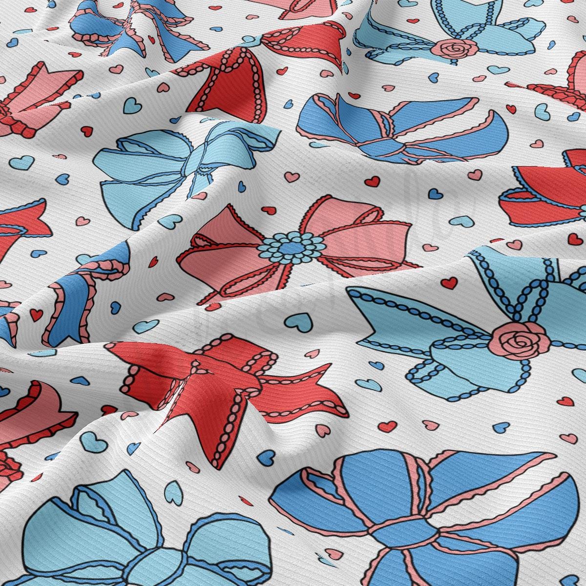 a red, white, and blue pattern of bows and hearts