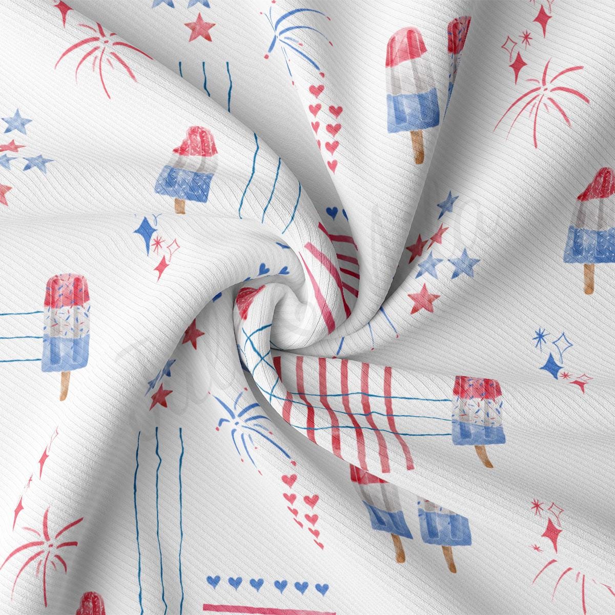 a white fabric with red, white, and blue fireworks
