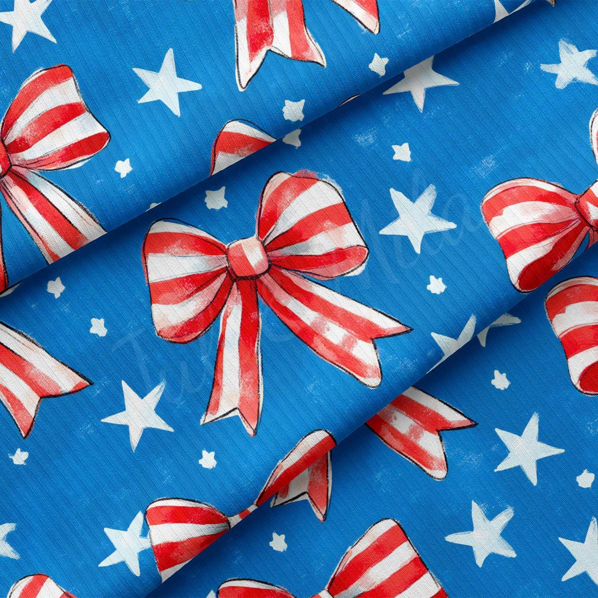 a blue background with red and white bows and stars
