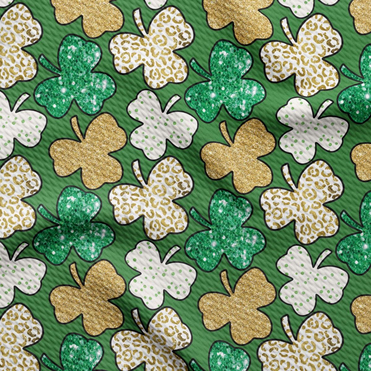 a green and gold shamrock pattern on a green background