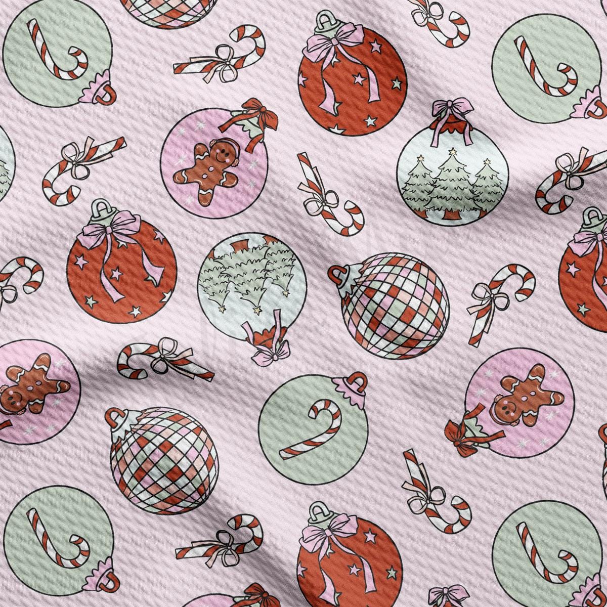 a pattern of christmas ornaments on a pink background