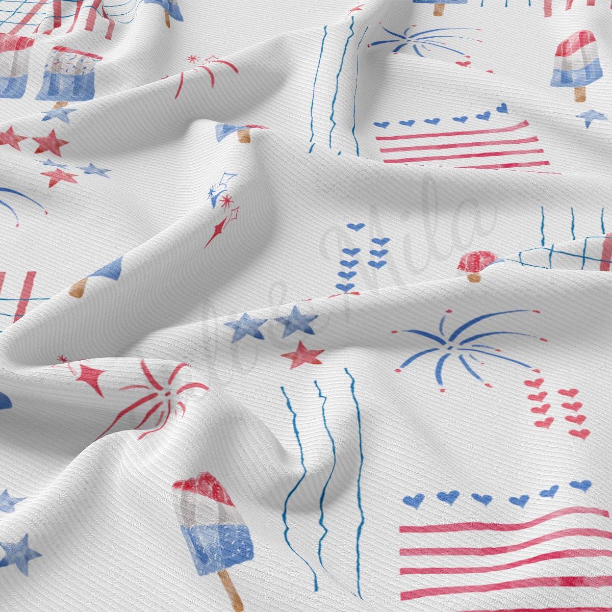 a white fabric with red, white, and blue fireworks