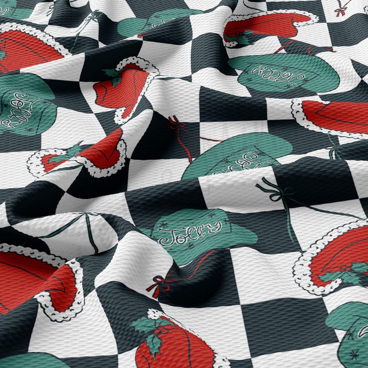 a black and white checkered fabric with red and green designs