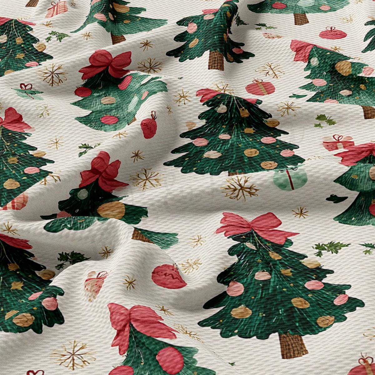 a close-up view of a fabric with a repeating pattern of Christmas trees and ornaments, including red bows and gold stars.