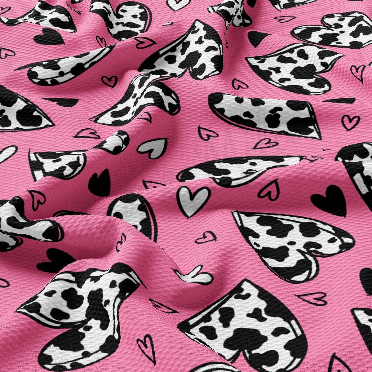 a pink background with black and white hearts and hearts