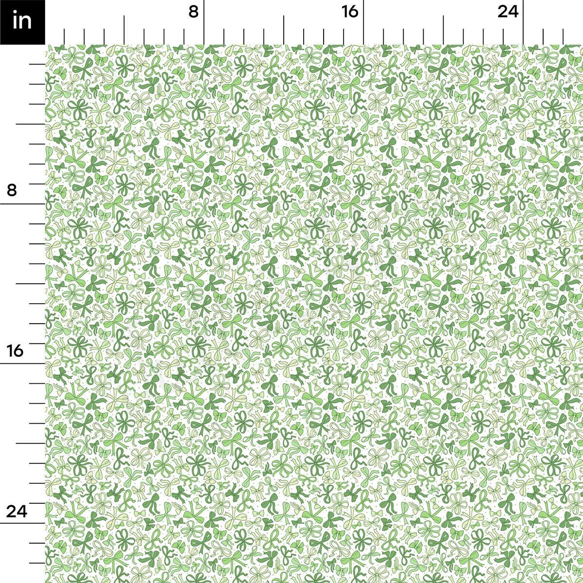 a ruler with a green floral pattern on it
