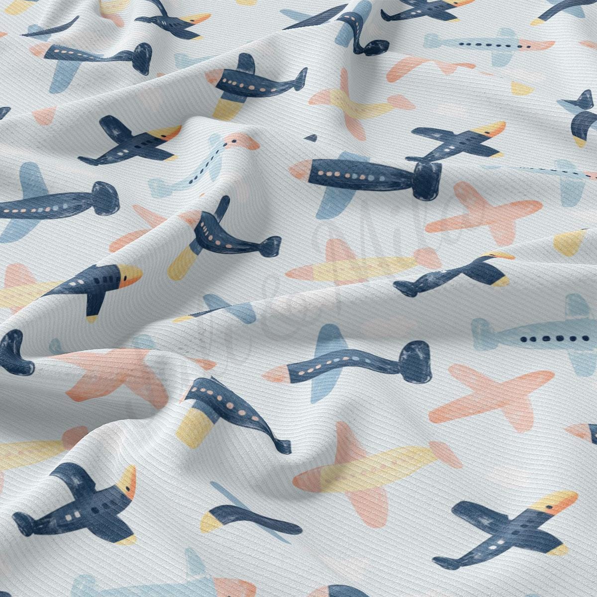 a pattern of small airplanes on a white background