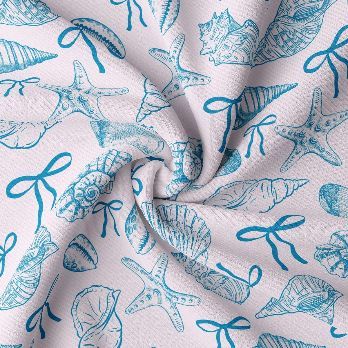 a close up of a blue and white fabric