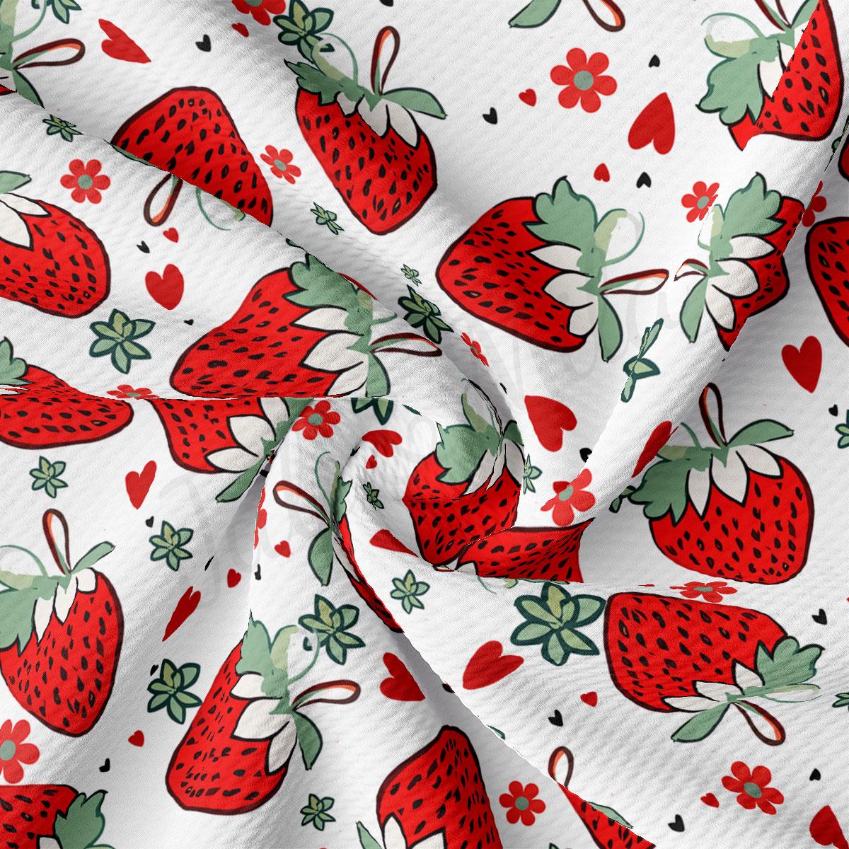 a close-up view of a fabric with a repeating pattern of red strawberries and green leaves. The pattern is composed of multiple strawberry images, each with a unique arrangement of leaves and stems. The fabric appears to be made of a soft, white material, and the overall composition is visually appealing and vibrant.
