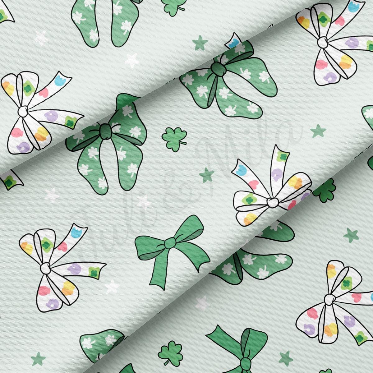 a white background with green bows and stars