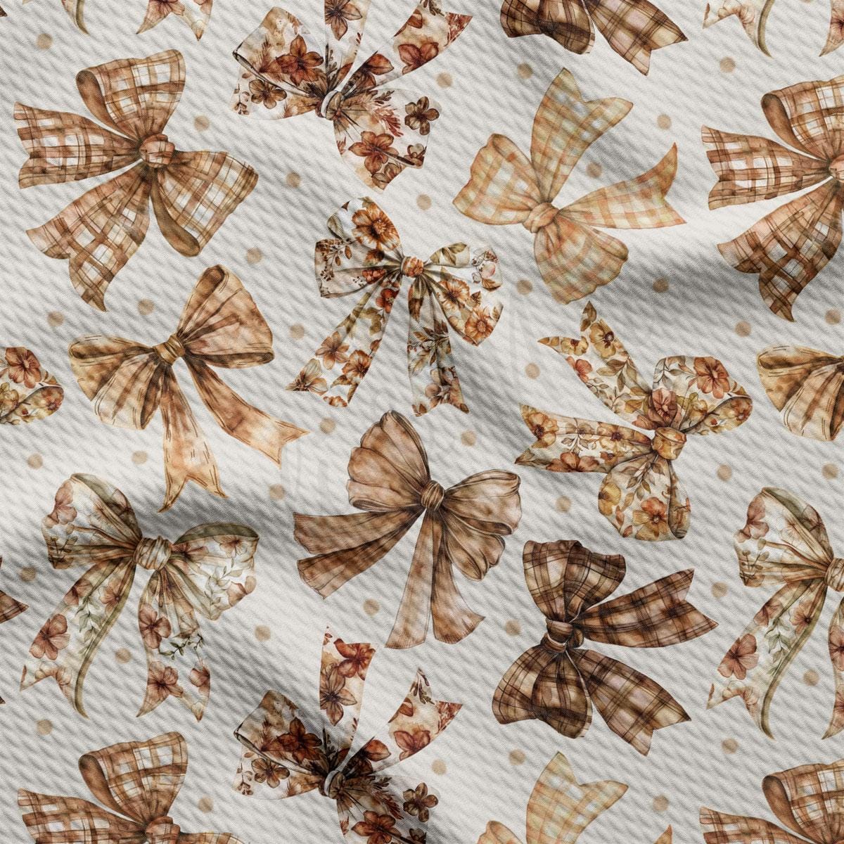 a repeating pattern of brown and white plaid bows against a white background.