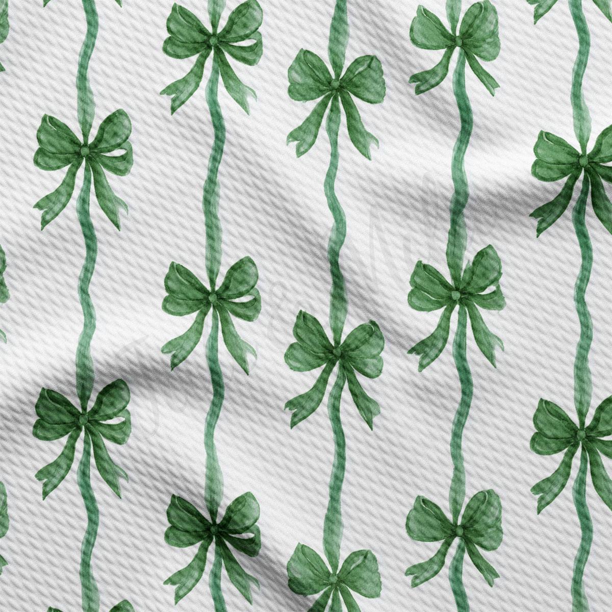a repeating pattern of green bows on a white background.