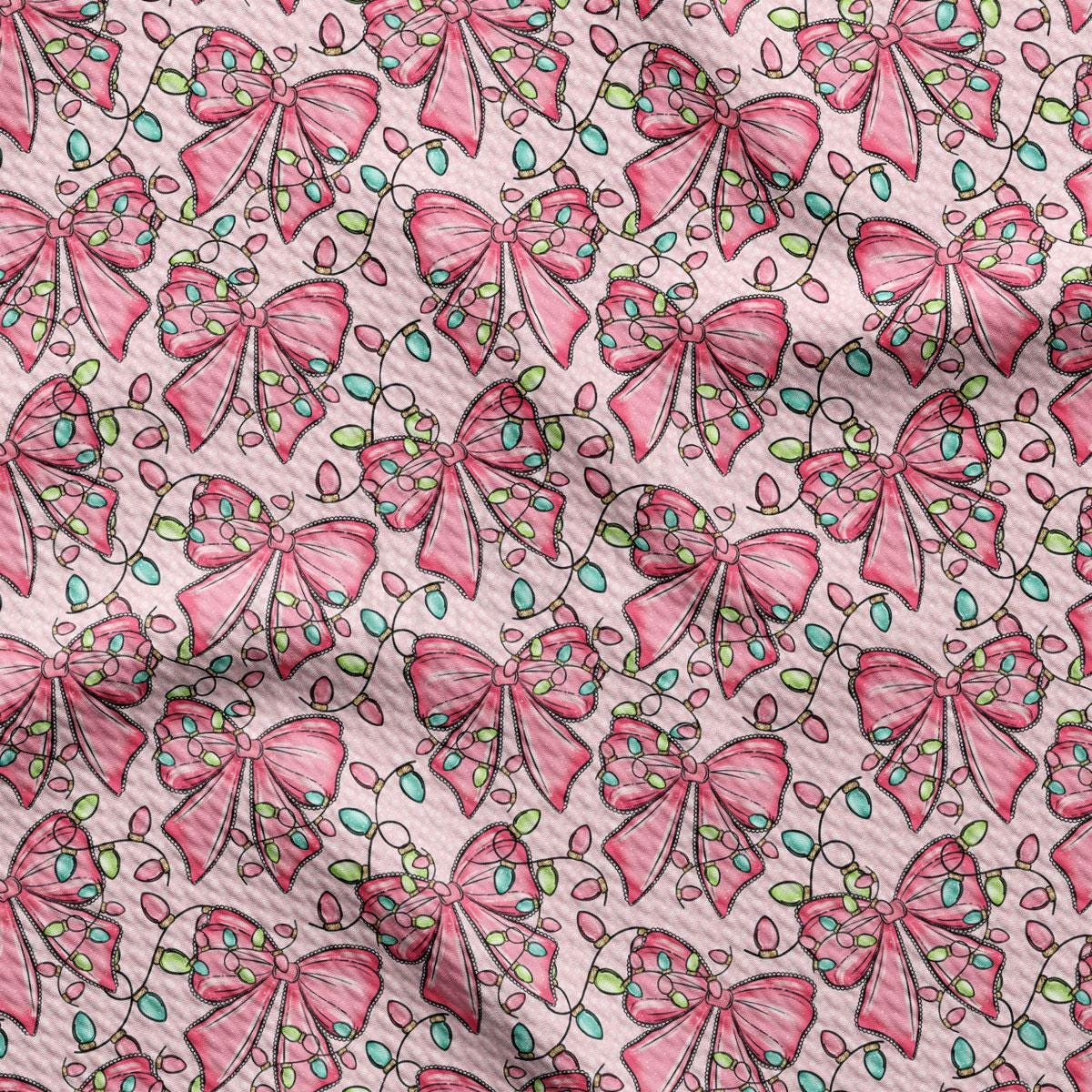 a repeating pattern of pink bows with green and blue lights, creating a festive and whimsical design.