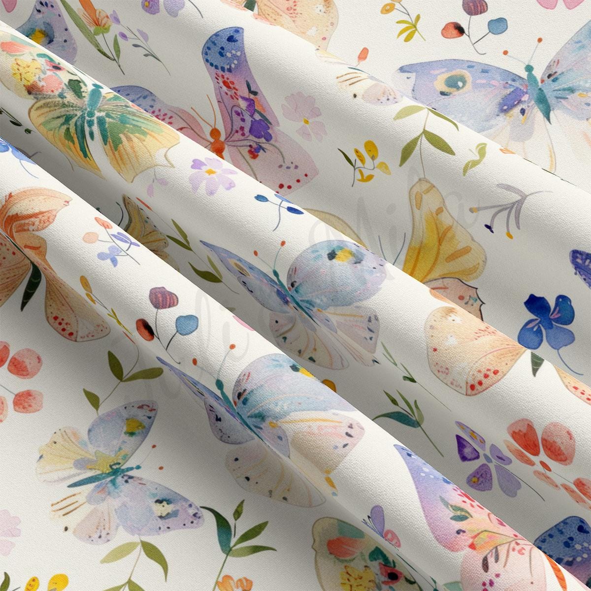 a close up of a flowered curtain with butterflies on it