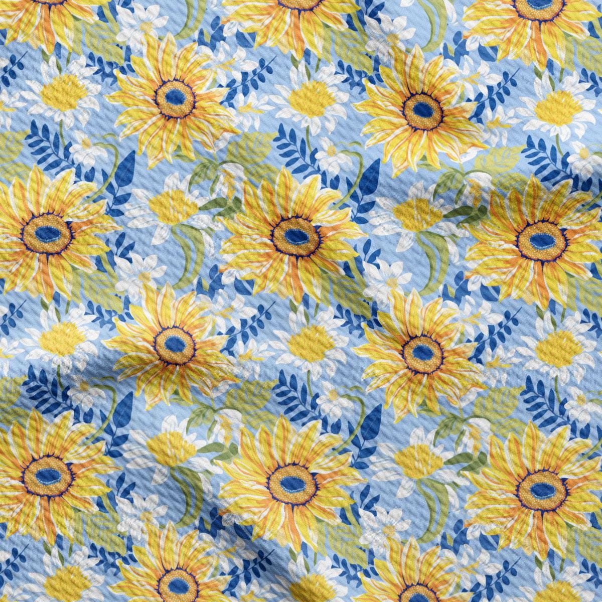 a blue and yellow floral print fabric
