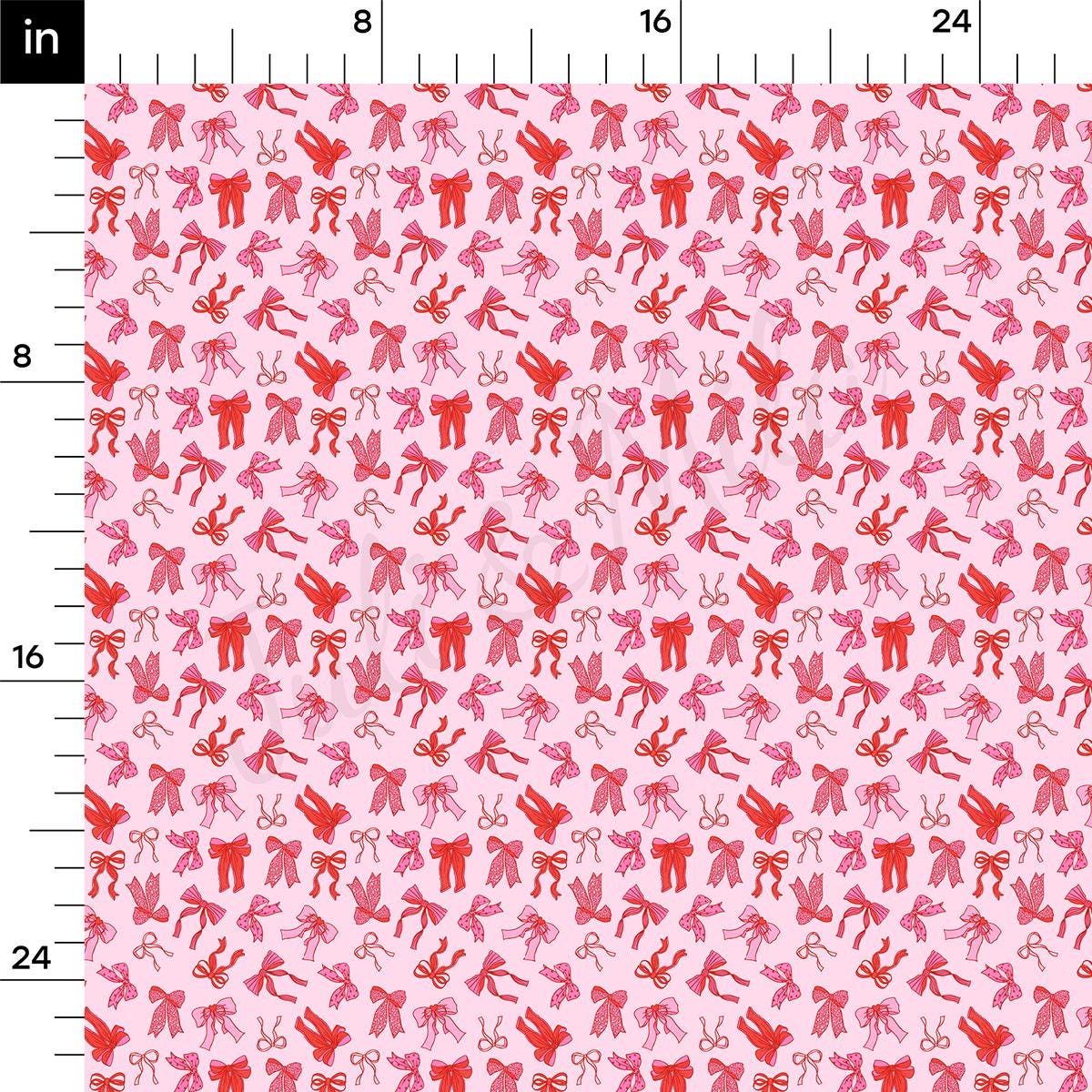 a pink and red pattern with a ruler in front of it