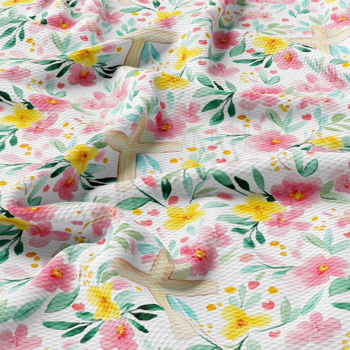 a floral print fabric with yellow and pink flowers