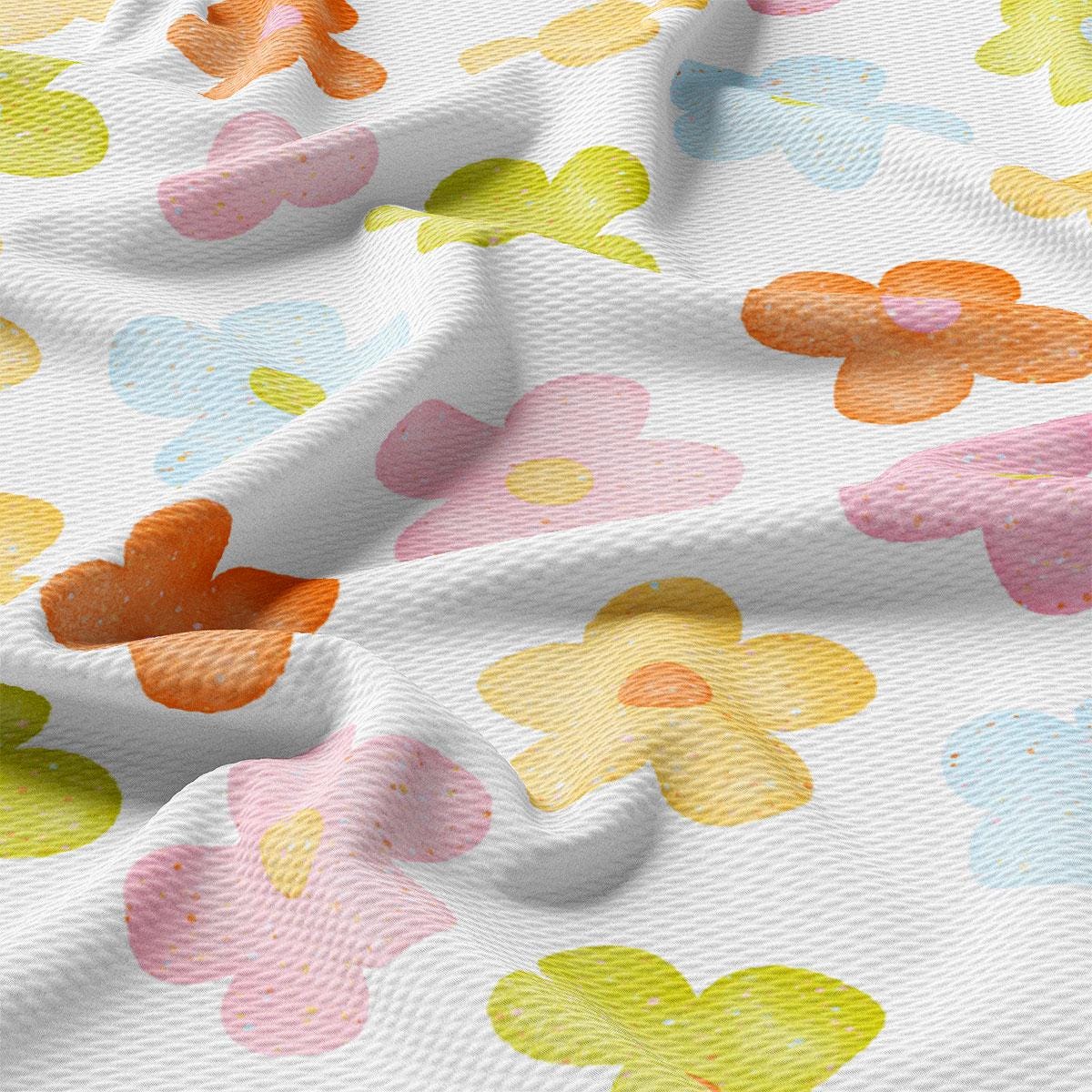 a close up of a colorful flower pattern on a white background
