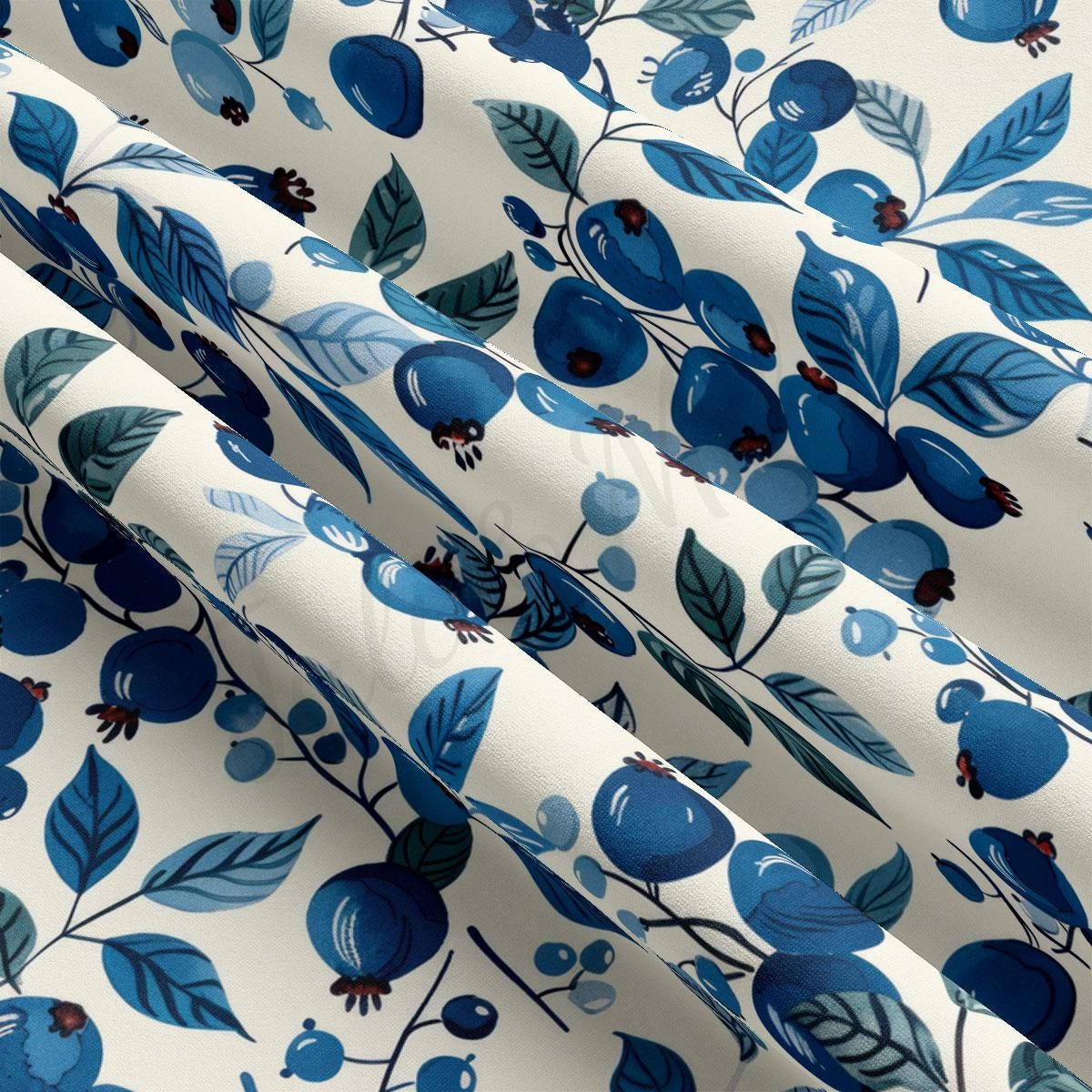 a close up of a blue and white flowered curtain