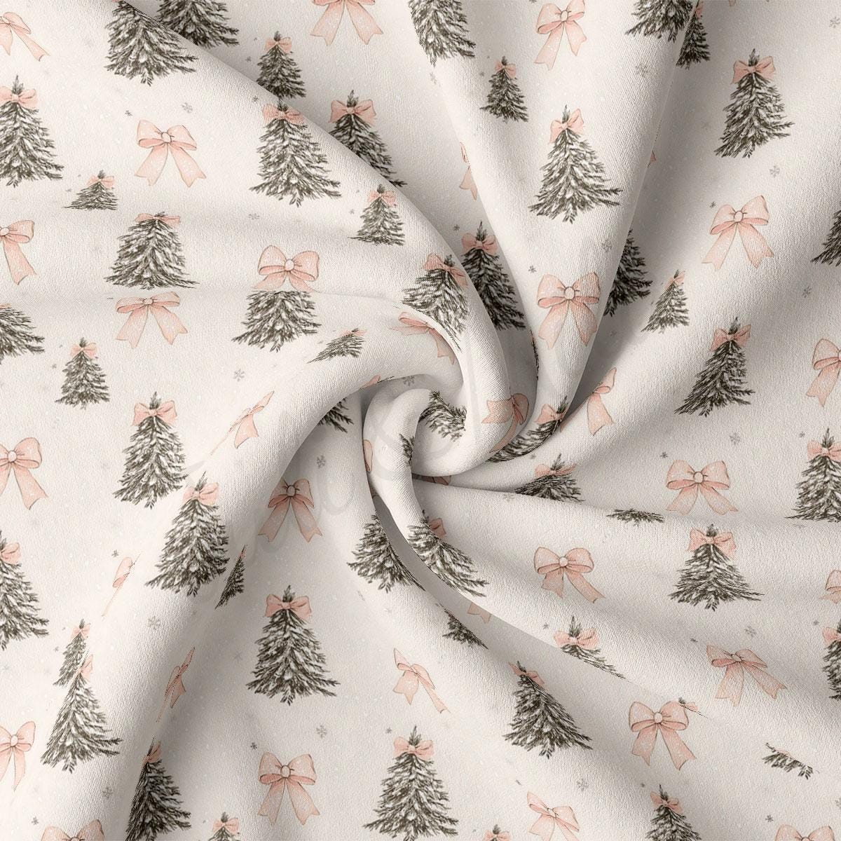 a close-up view of a fabric with a repeating pattern of Christmas trees and pink bows.