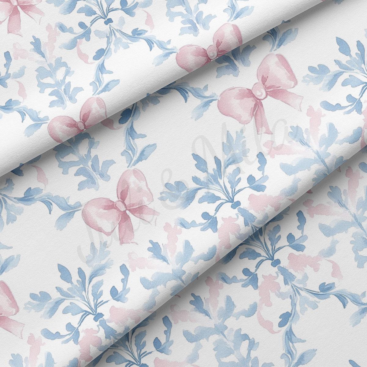 a repeating pattern of pink bows and blue leaves on a white background.