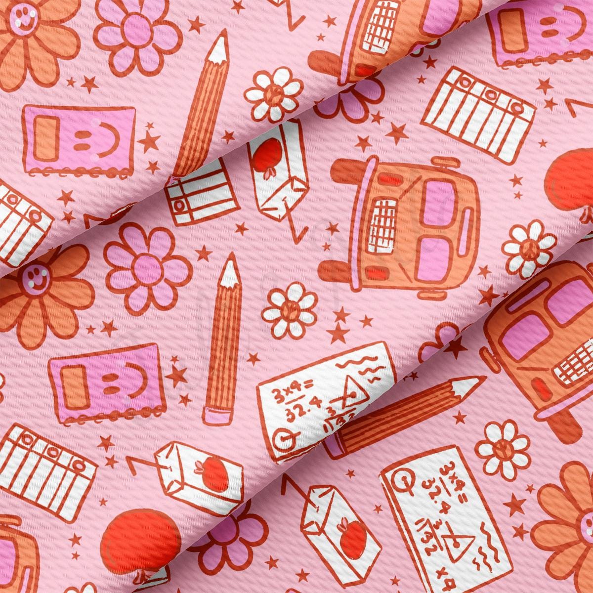 a pink background with a pattern of school supplies