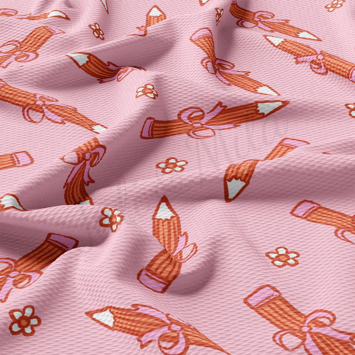 a close up of a pink fabric with a pattern on it