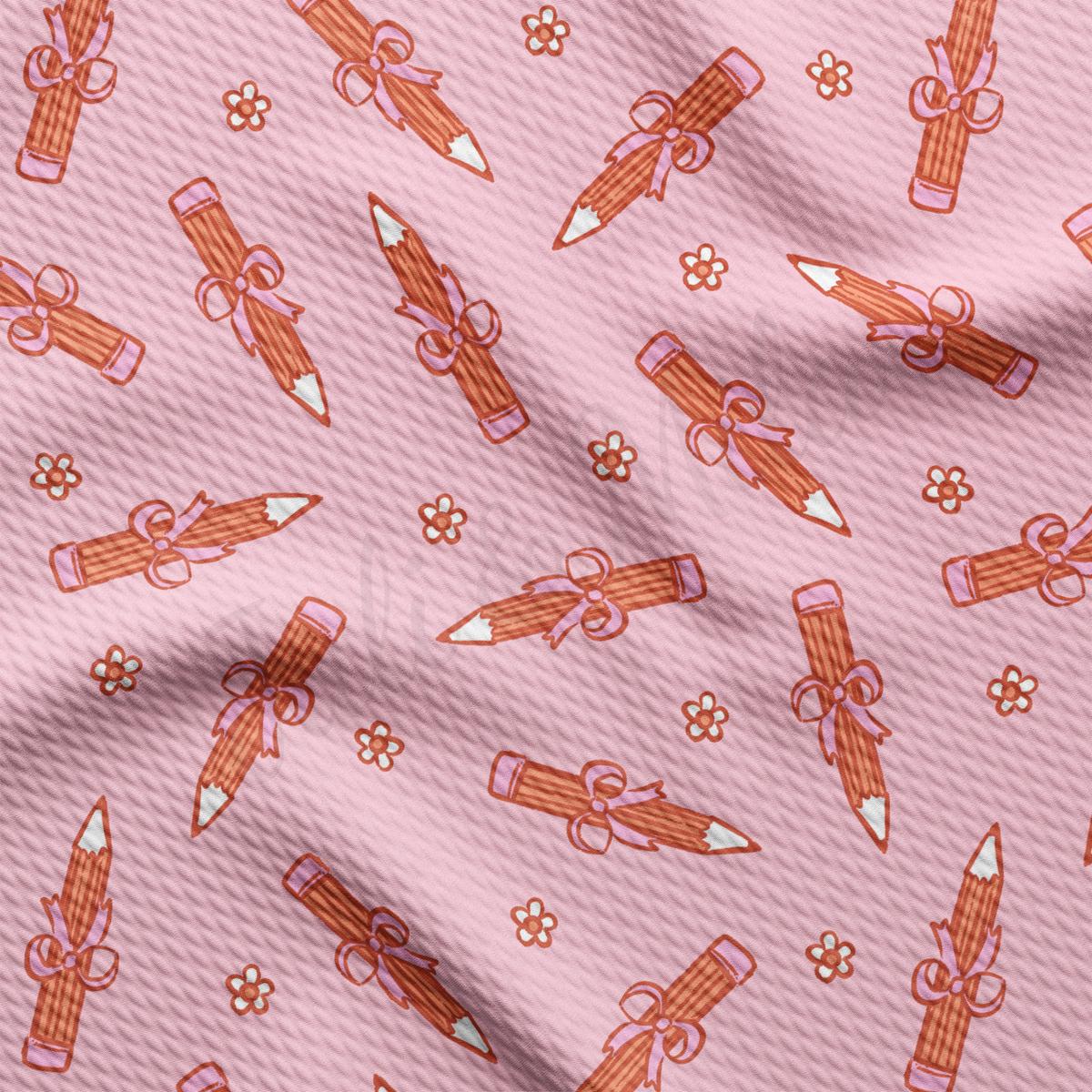 a pink background with a pattern of pencils and bows