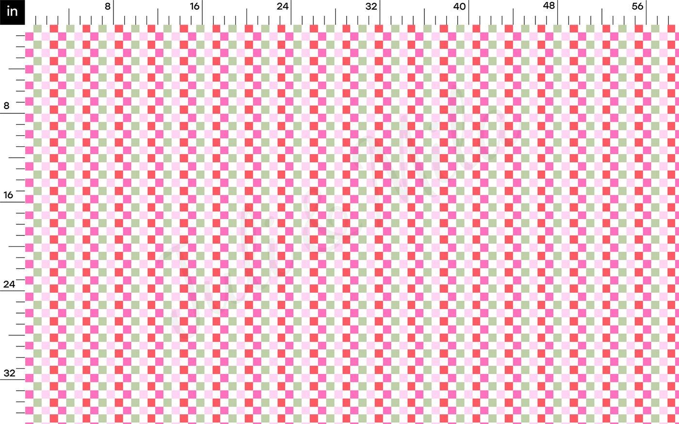a ruler with a red and green checkered pattern on it