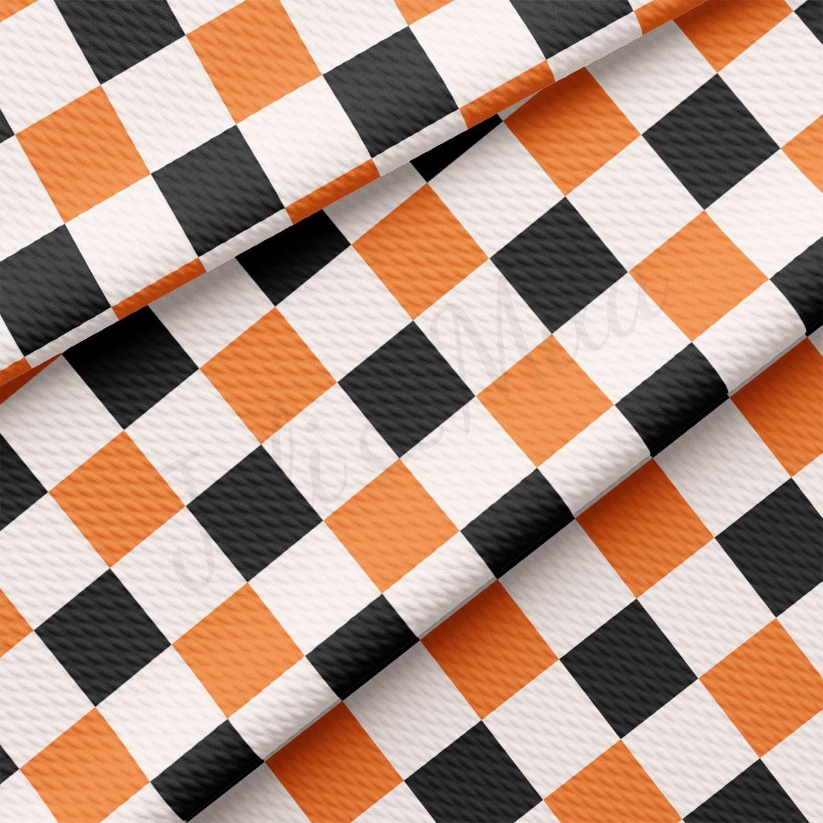 an orange and black checkered fabric
