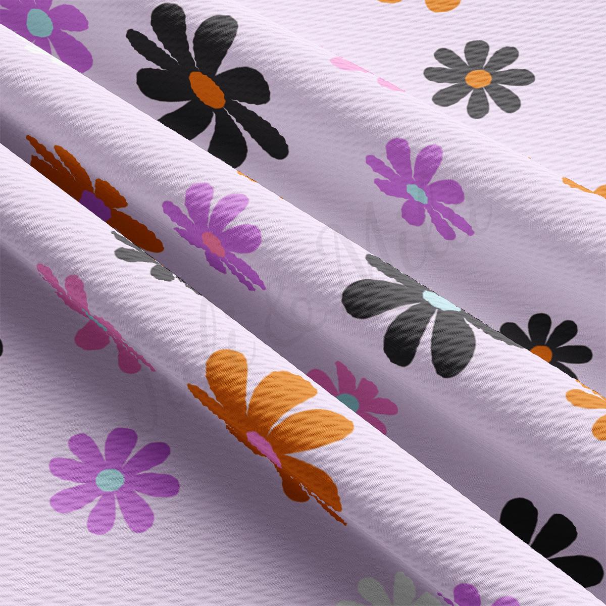 a close up of a flower pattern on a white background
