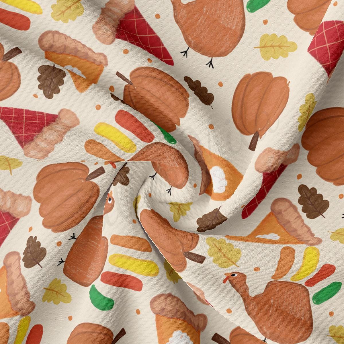 a close up of a white fabric with a pattern of leaves and acorns