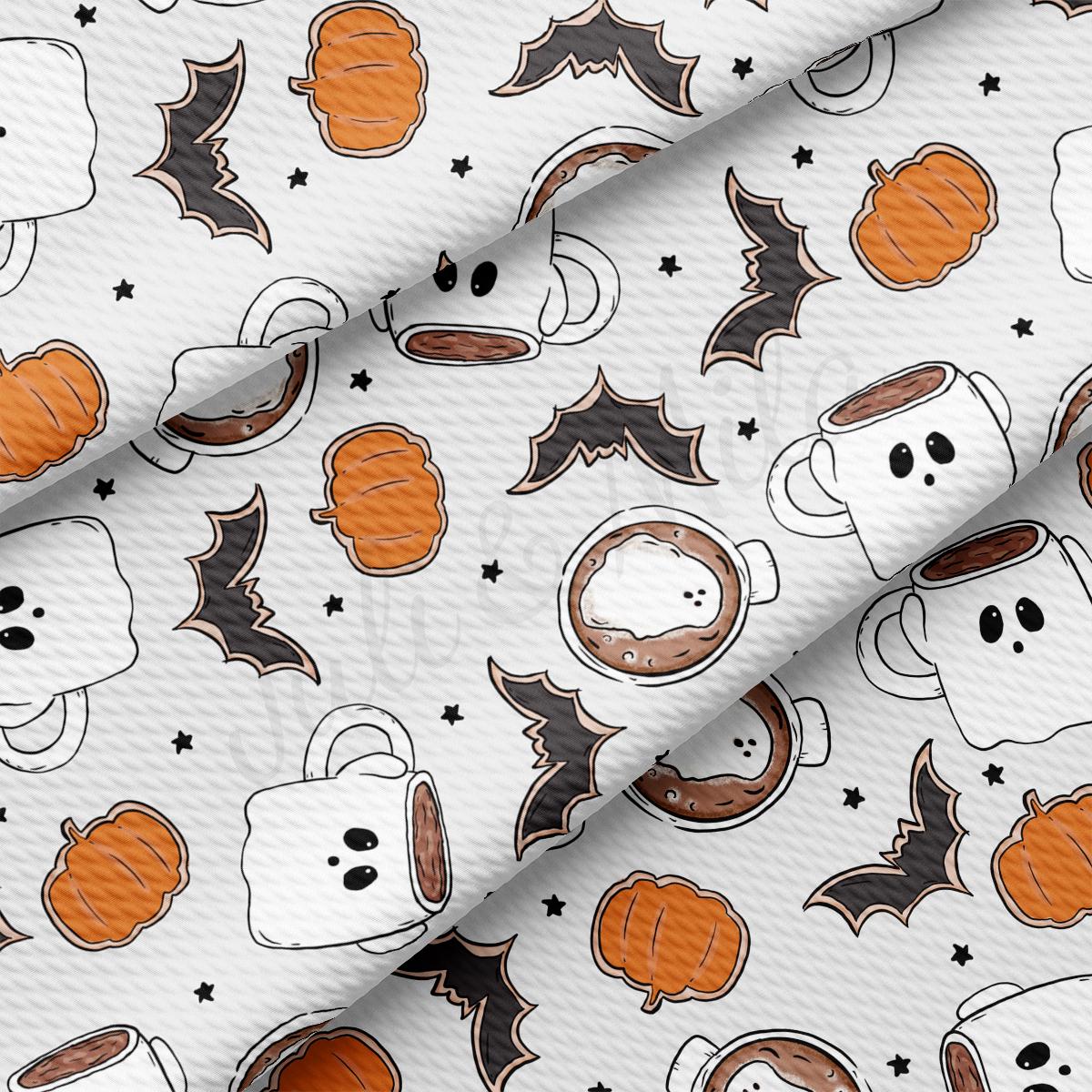a close up of a pattern of coffee and pumpkins