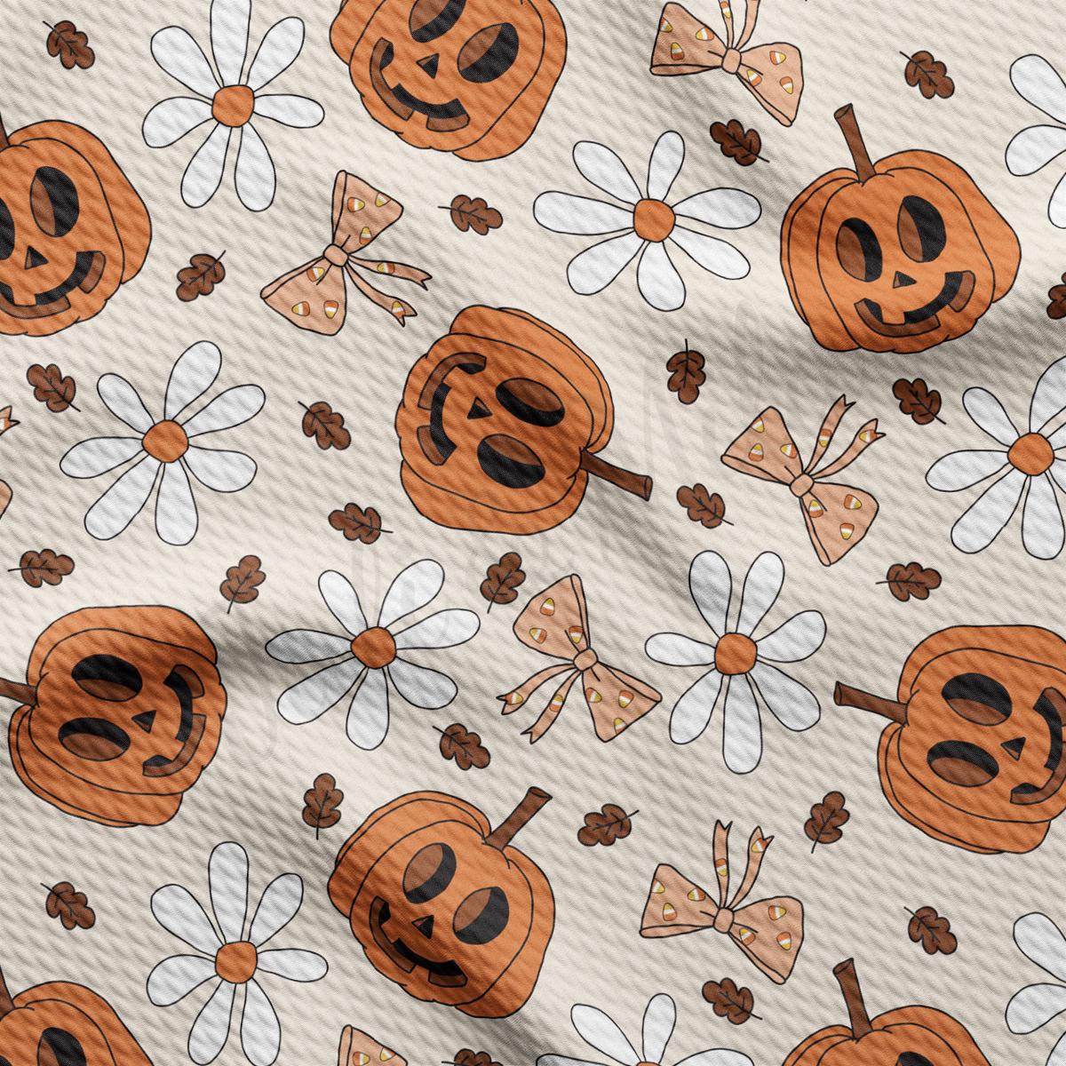 a pattern of pumpkins and daisies on a white background