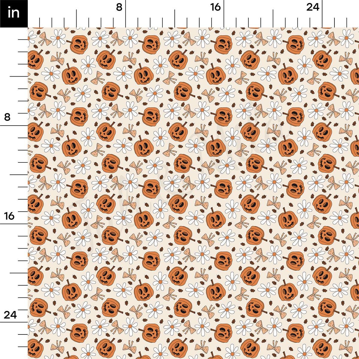 a ruler with a pattern of pumpkins on it