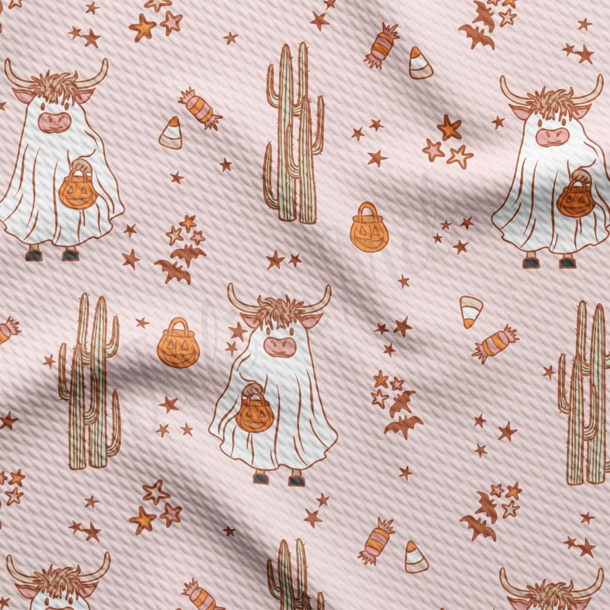 a pattern of a cow with a pumpkin on a pink background