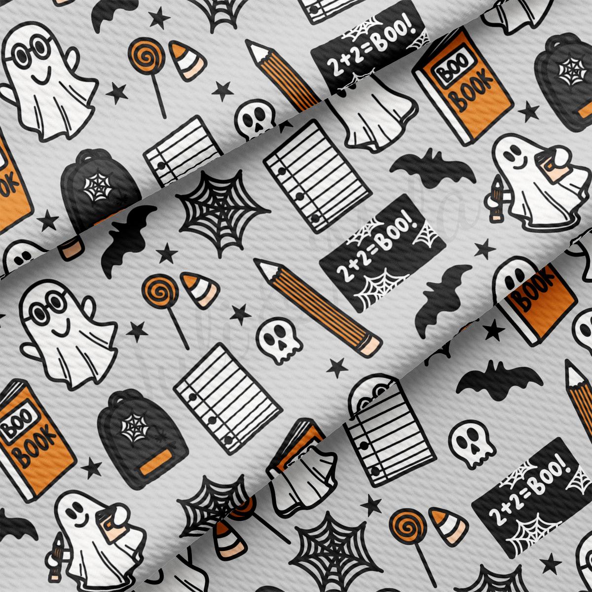 a pattern of halloween items on a white background