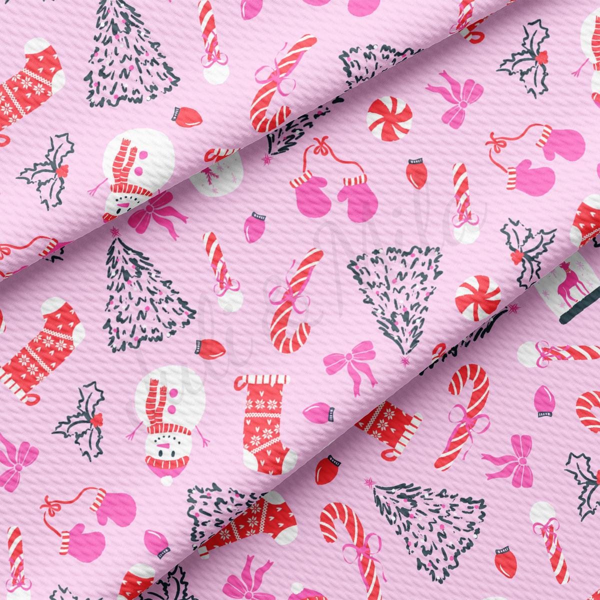 a pink background with candy canes and christmas trees